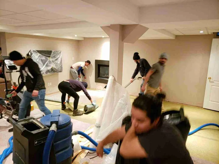 A crew restoring commercial water damage in an Antioch, IL building