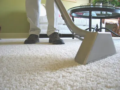 A technician extracting standing water from a floor in Antioch, IL